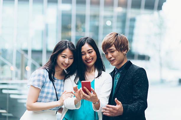 istock Young asian people making selfie on street 624148160