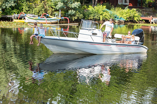 istock family enjoying a summer day on a boat 624154214