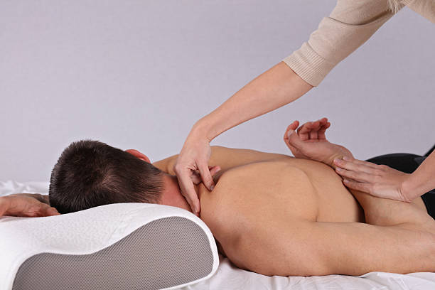 istock Man having sport massage. Acupressure, Chiropractic, osteopathy, concept . 624154656