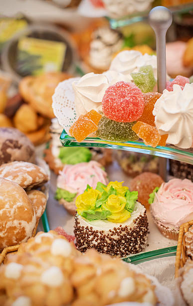 istock vertical background with fresh sweet baked cakes 624159890