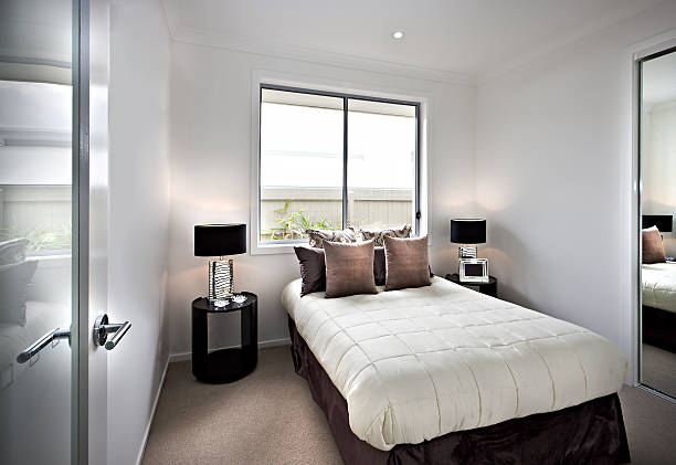 istock Modern and classic bedroom with windows and lamps 624160592