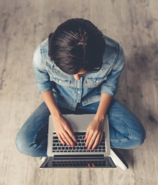istock Beautiful young woman with gadget 624161690
