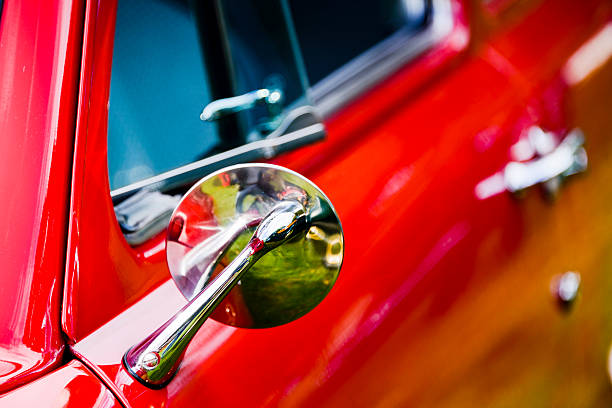 istock Classic car mirror on a red car 624169368