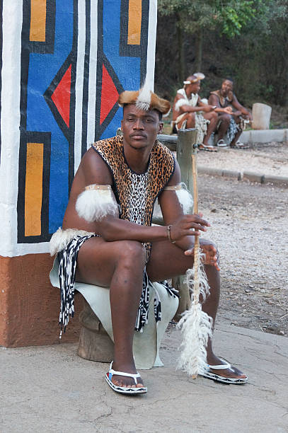 african man in traditional dress at lesedi cultural village. - south africa africa zulu african culture imagens e fotografias de stock
