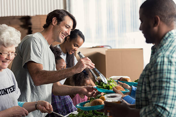 istock A group of friends volunteer in soup kitchen 624178568