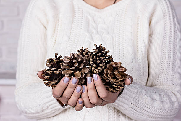 istock Cones in the hands of women. 624181390