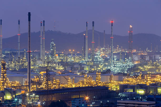 istock Oil refinery lights night view 624182398