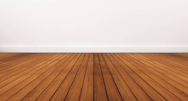 Wooden floor and white wall stock photo