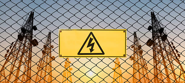 istock High Voltage Sign and Symbol Caution Signboard on Fence Wire 624183314