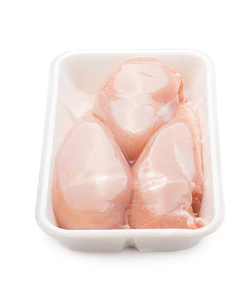 istock Meat. Raw chicken fillet package isolated on white background with 624193992