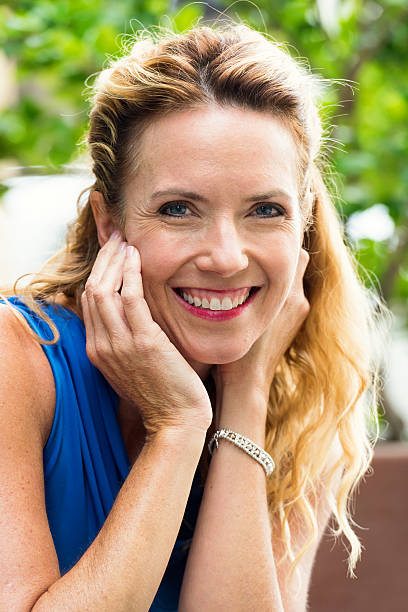 istock Smiling Mature Blond Woman 624194022