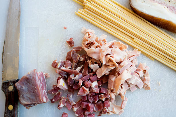 ingredients to prepare amatriciana pasta ingredients to prepare amatriciana bucatini amatrice stock pictures, royalty-free photos & images