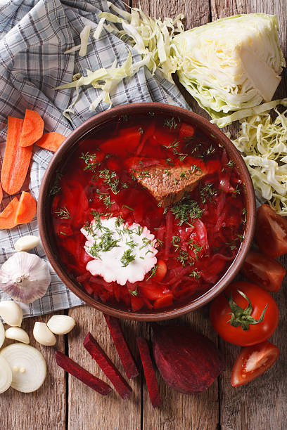 istock Ukrainian borsch soup and ingredients closeup. vertical top view 624205962