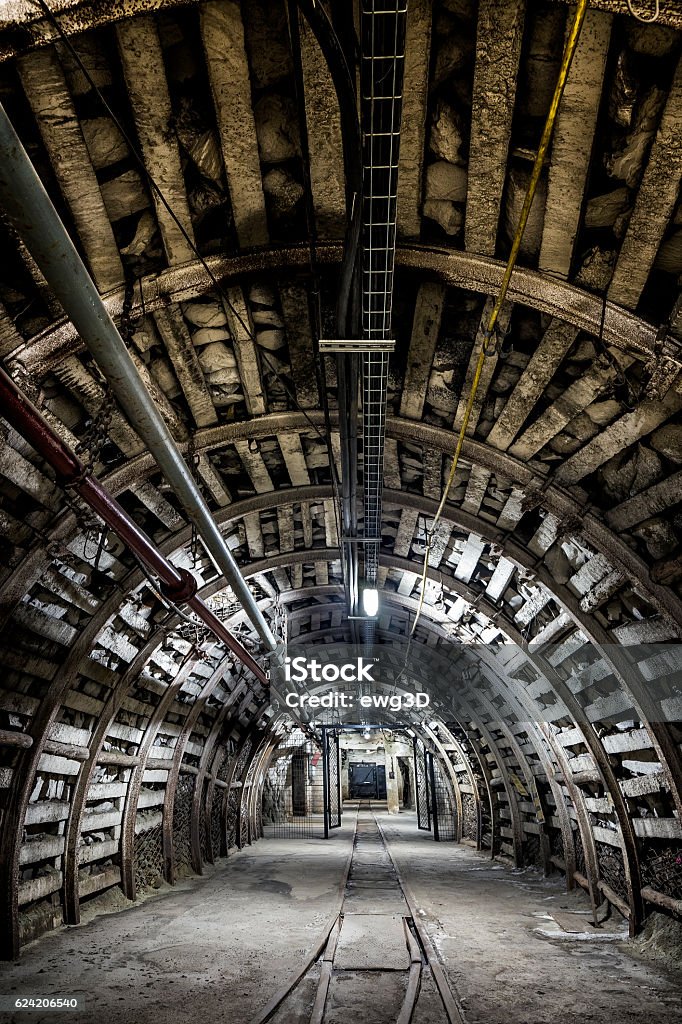 Underground corridor with steel support system Underground corridor with steel support system in coal mine Bielszowice, Ruda Slaska, Poland Built Structure Stock Photo