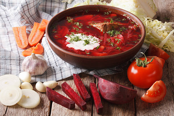 istock Ukrainian borsch and ingredients on the table close-up. horizontal 624206894