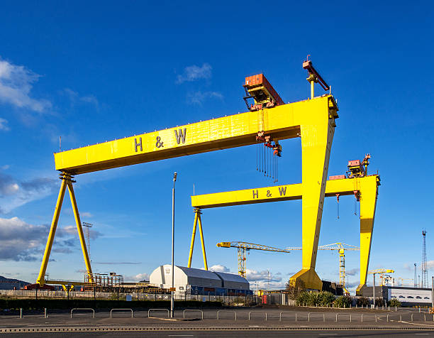 Belfast, Norther Ireland, United Kingdom - October 2, 2016: Samson and Goliath. Twin shipbuilding gantry cranes in Titanic quarter, famous landmark of Belfast, Norther Ireland. Goliath is in the foreground.