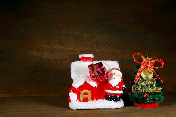 istock Christmas tree and Santa Claus and house 624208888