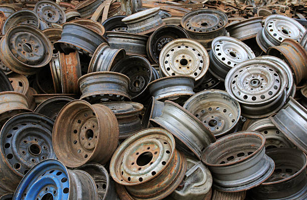 Heap of old car alloy wheels prepare for recycle