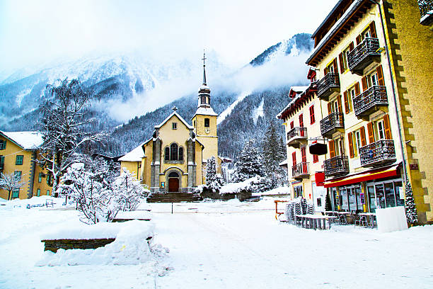 Church in Chamonix town, France, French Alps, part of street Church in Chamonix, France, French Alps in winter, street view and snow mountains mont blanc photos stock pictures, royalty-free photos & images