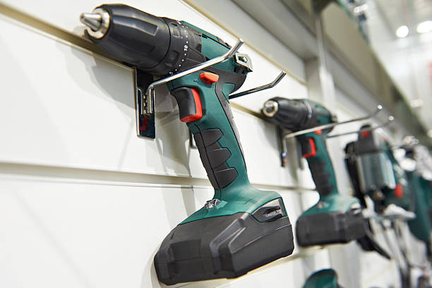 istock Electric screwdriver for construction on stand in shop 624215746