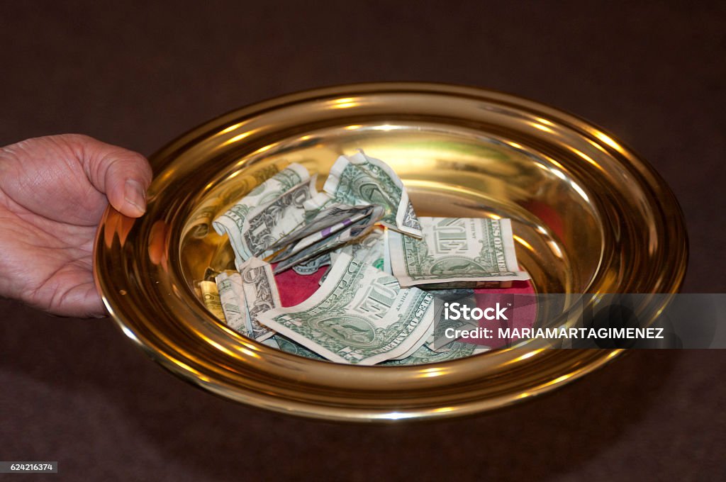 Offering Plate and tithe Religious Offering Stock Photo