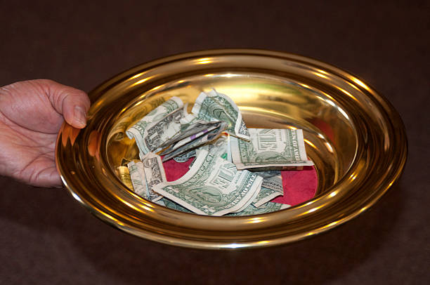 Offering Plate and tithe Offering Plate and tithe religious offering stock pictures, royalty-free photos & images