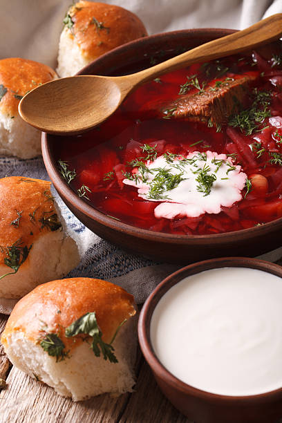 istock Traditional Ukrainian borsch soup close up in a bowl. Vertical 624217066