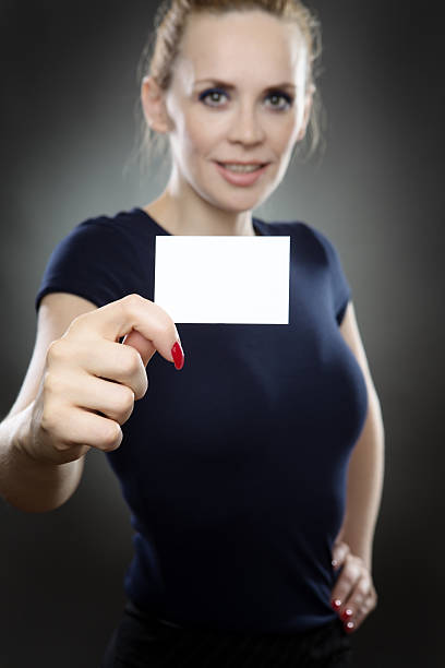 istock woman with small business card 624217458