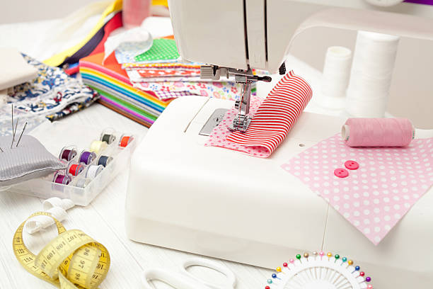 istock sewing, sewing on the sewing machine, sewing supplies, colored s 624223468
