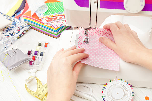istock sewing, sewing on the sewing machine, sewing supplies, colored s 624223616