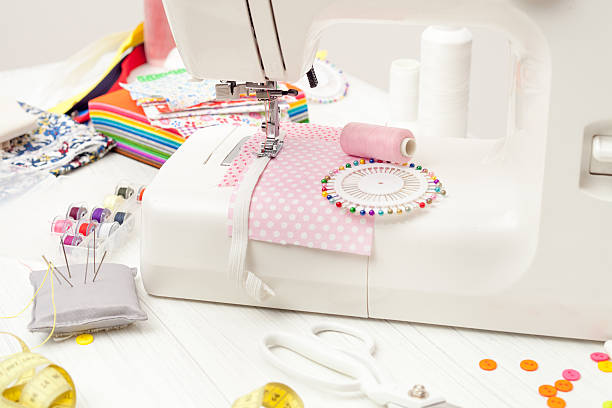 istock sewing, sewing on the sewing machine, sewing supplies, colored s 624223686