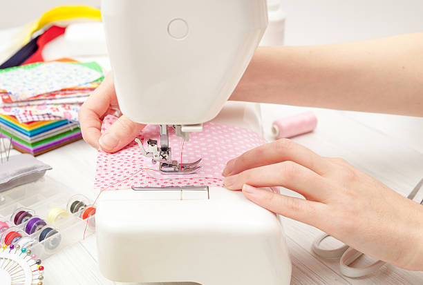 istock sewing, sewing on the sewing machine, sewing supplies, colored s 624223894