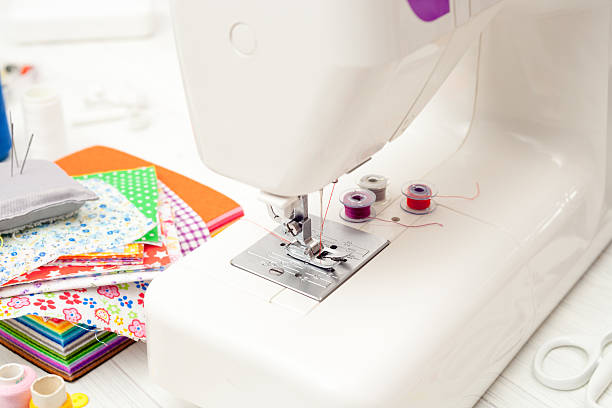 istock sewing, sewing on the sewing machine, sewing supplies, colored s 624224320