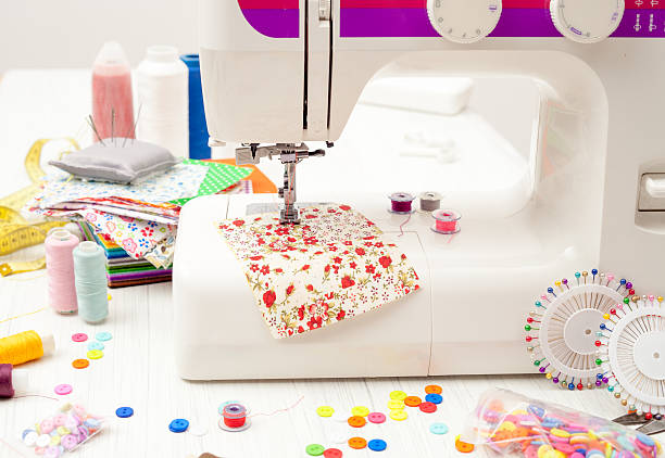 istock sewing, sewing on the sewing machine, sewing supplies, colored s 624224566