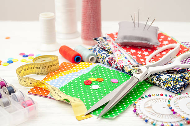 istock sewing, sewing on the sewing machine, sewing supplies, colored s 624225362
