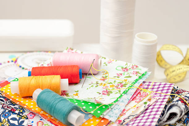 istock sewing, sewing on the sewing machine, sewing supplies, colored s 624225556