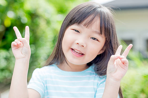 istock little girl smile happily 624225766