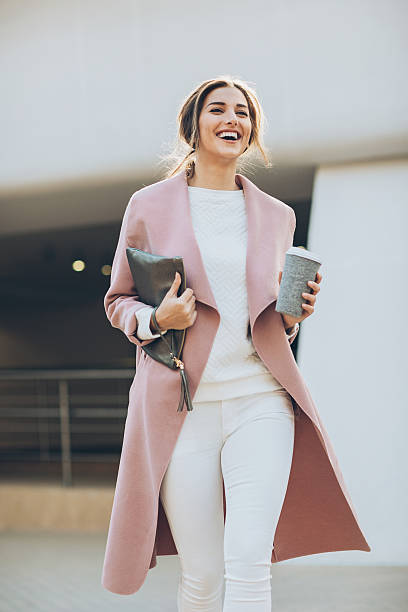 istock Young woman walking outdoors 624248916
