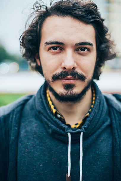istock Close up of young man's face 624249210