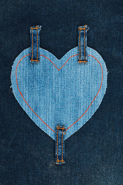 istock Heart made of denim fabric and attached three straps 624249270