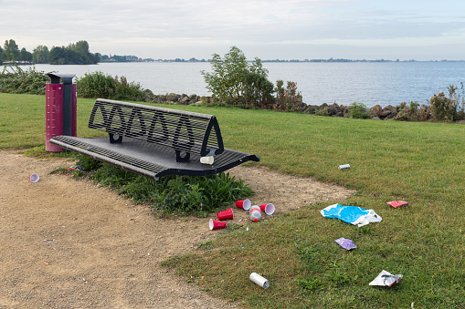 Uncollected rubbish at picnic place near Dutch lake