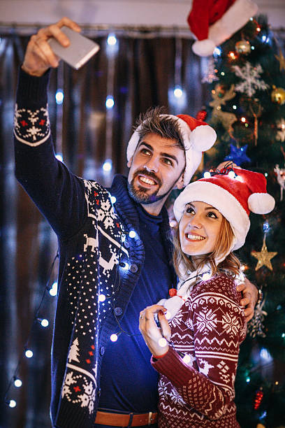 istock New year's eve selfie 624279742