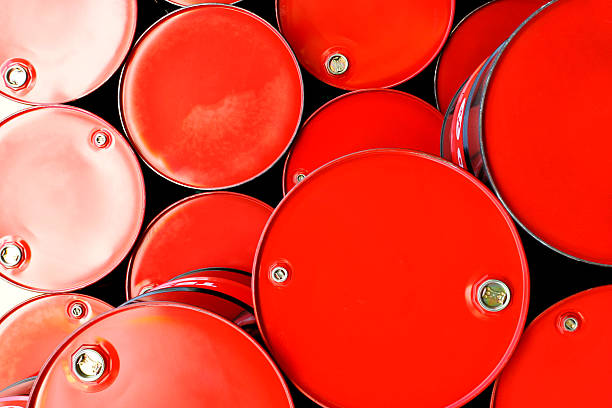 istock Oil barrels at refinery factory 624280528