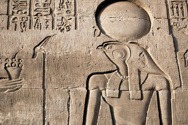 Egypt: Temple of Kom Ombo Kom Ombo, Egypt - July 23, 2016: A carving of Horus on a wall at the Temple of Kom Ombo, constructed during the Ptolemaic dynasty, 180–47 BC. horus photos stock pictures, royalty-free photos & images