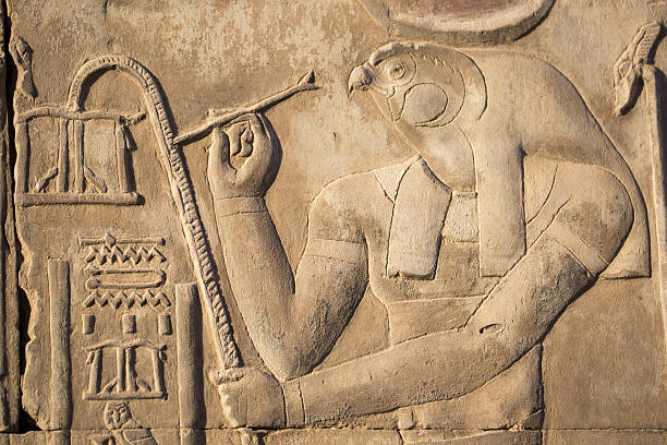 Egypt: Temple of Kom Ombo Kom Ombo, Egypt - July 23, 2016: A carving of Horus on a wall at the Temple of Kom Ombo, constructed during the Ptolemaic dynasty, 180–47 BC. horus photos stock pictures, royalty-free photos & images