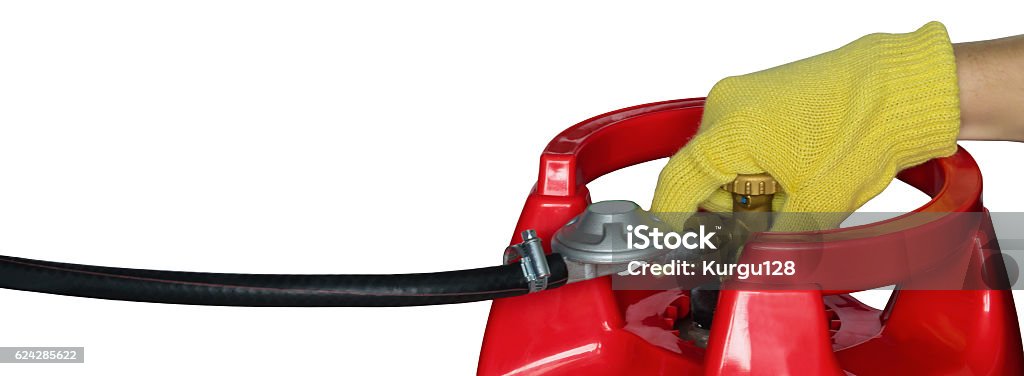 hand in glove closes the cylinder valve Armored Tank Stock Photo