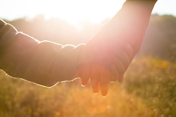 istock mother and child hands 624285760