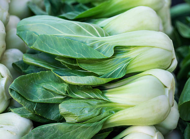 istock Bok Choy Stacked in a Market 624289594