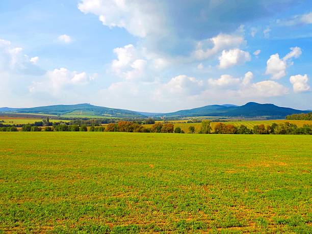 istock Field and mountains landscape during sunny day 624357624