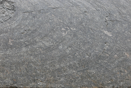 Uniform stone texture with cracks and natural rows